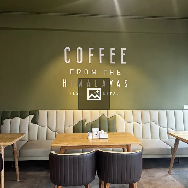 Café Interior with Olive Wall