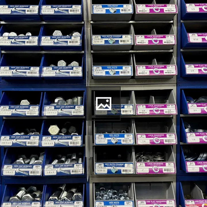 Rack of drawers with nuts and bolts