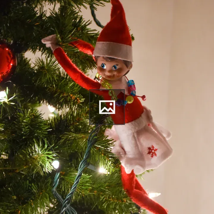 Elf on a Shelf in Christmas Tree