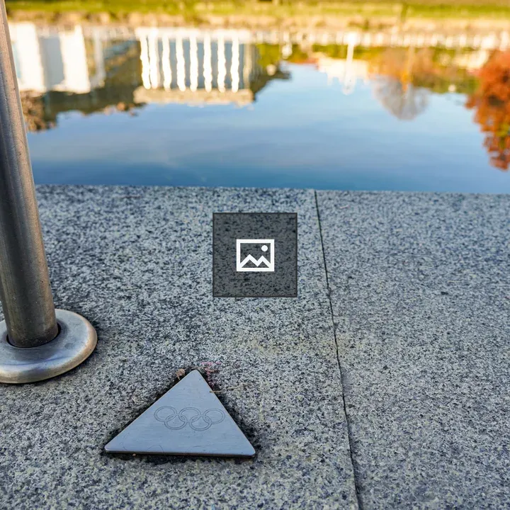 Metal handrail and triangular plaque