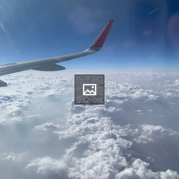 Airplane Wing Against Sky