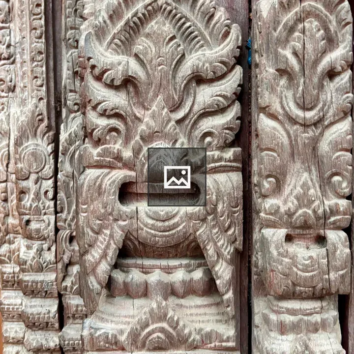 Intricately carved wooden panel