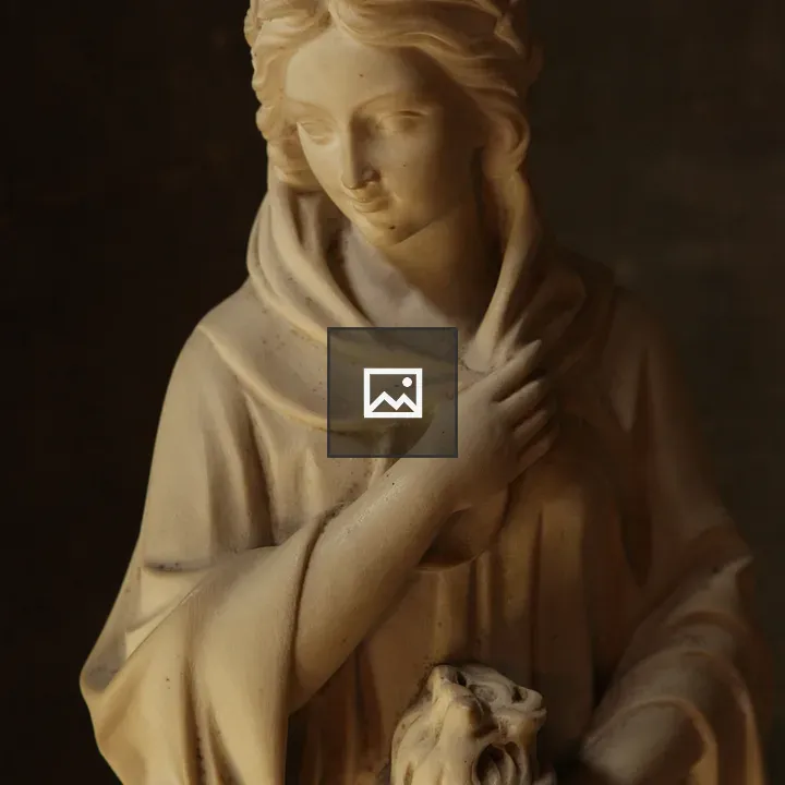 Sculpture of a Woman with Vessel
