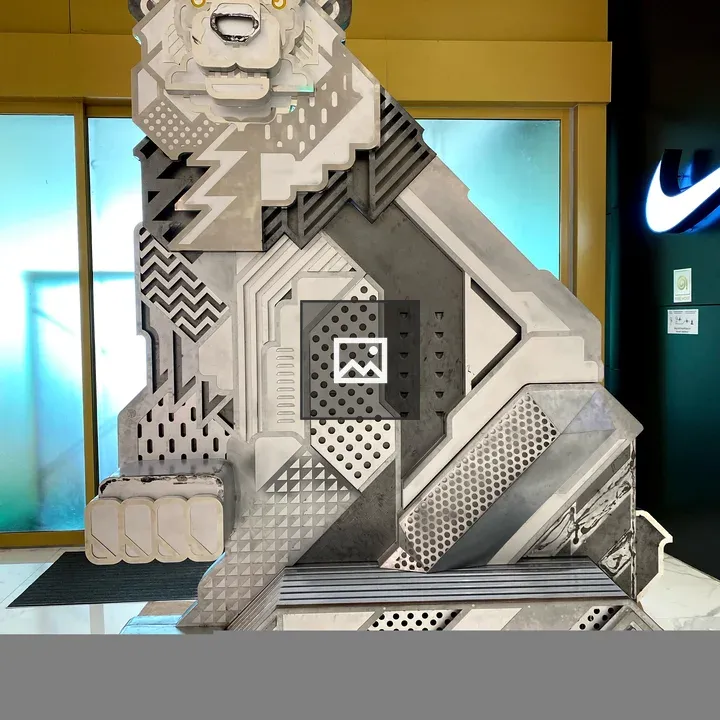 Metallic cat statue
