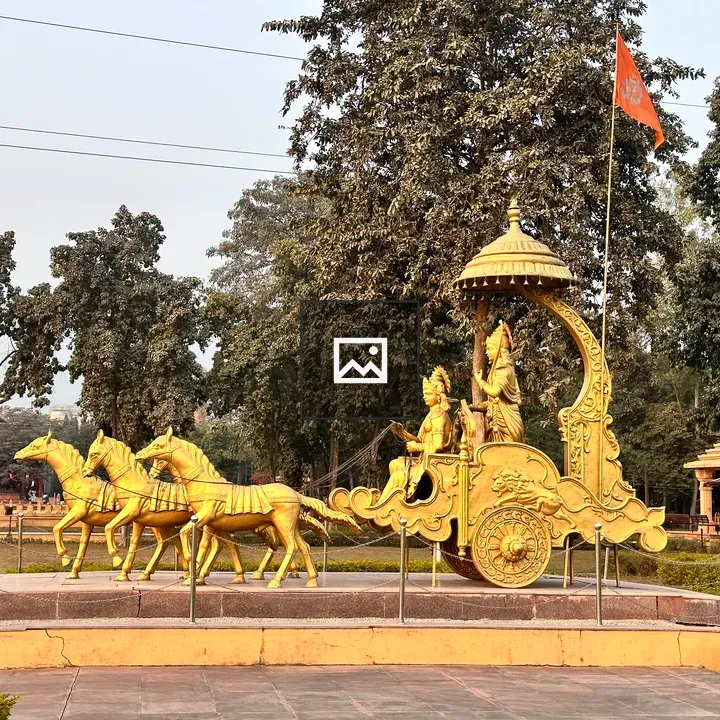Golden chariot sculpture