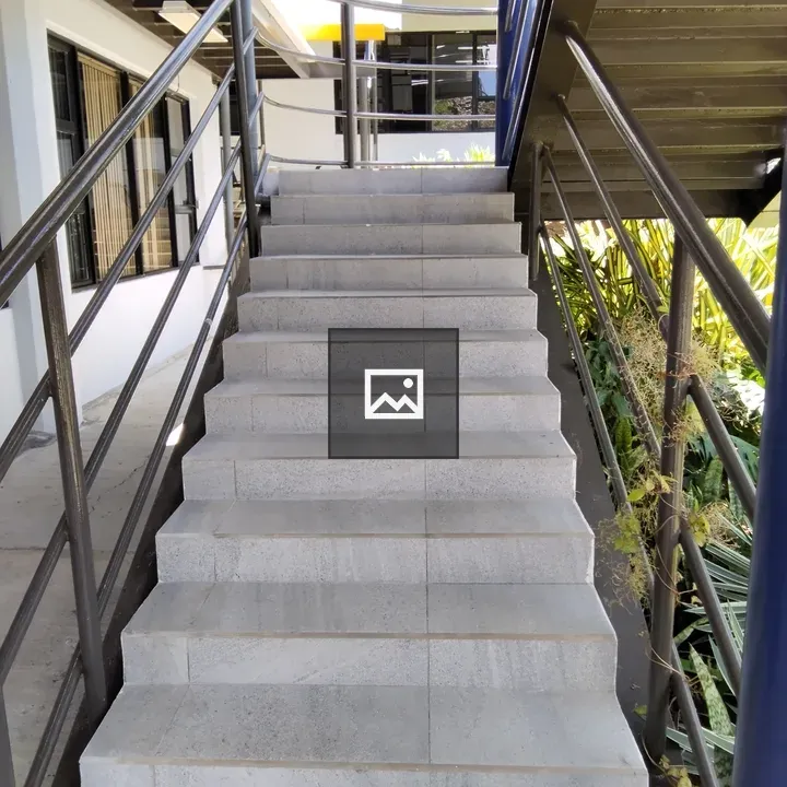 Concrete stairs with metal railings