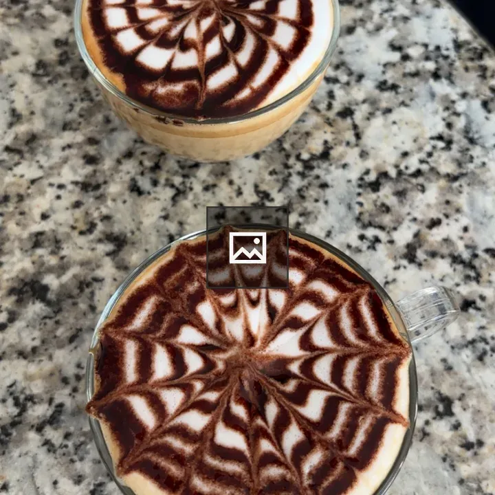 Two cappuccinos on granite