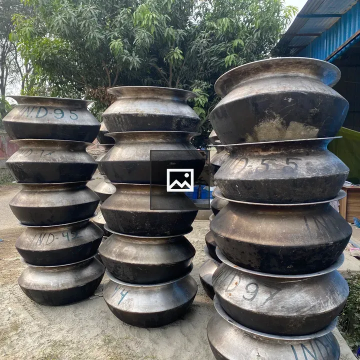 Industrial pots and blue shed