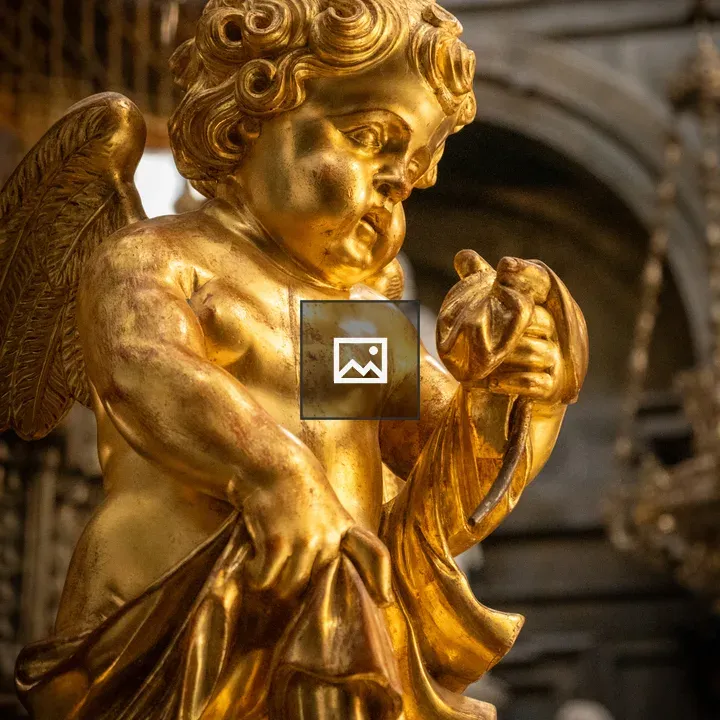 Golden angel statue in Turin chapel