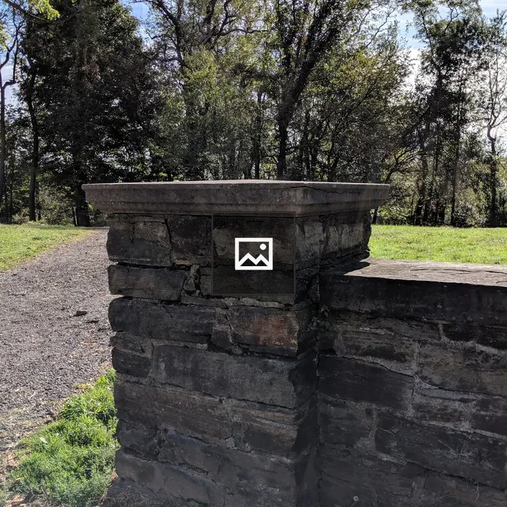 End of a stone wall in Frick Park