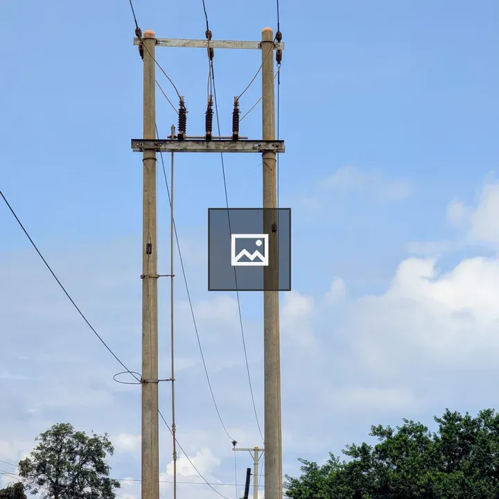 Tall concrete utility pole
