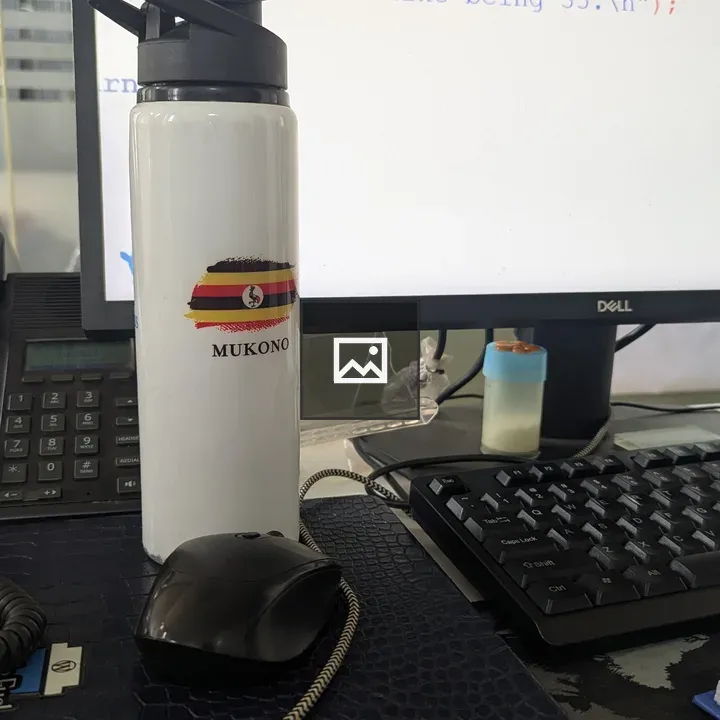 Ugandan Flag Bottle on Desk