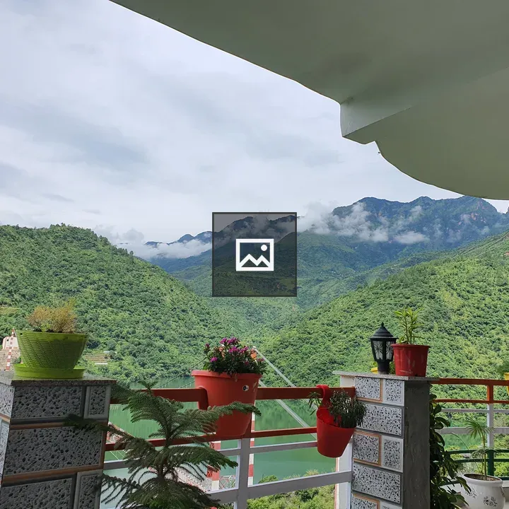 Balcony View With Greenery and Mountains