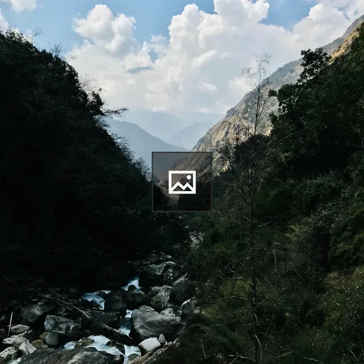 Mountain valley with rocky stream