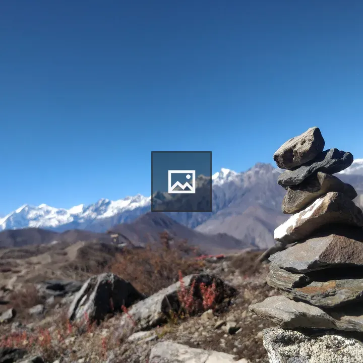 Wishing stones in mountain landscape