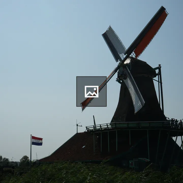 Windmill at Zaanse Schans with Dutch Flag