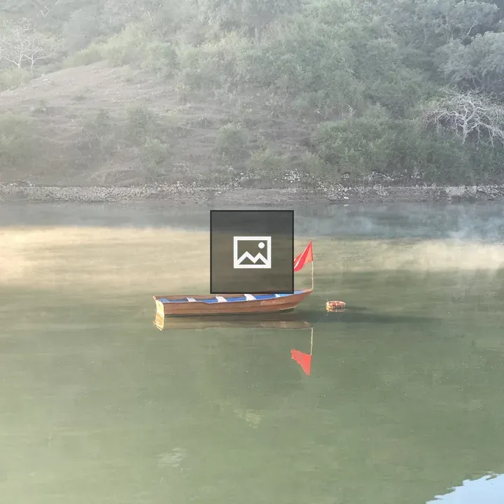 Lake with Boat and Flag