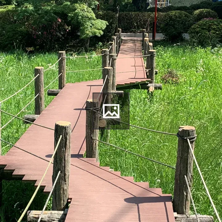 Footbridge over pond at Mobara Park