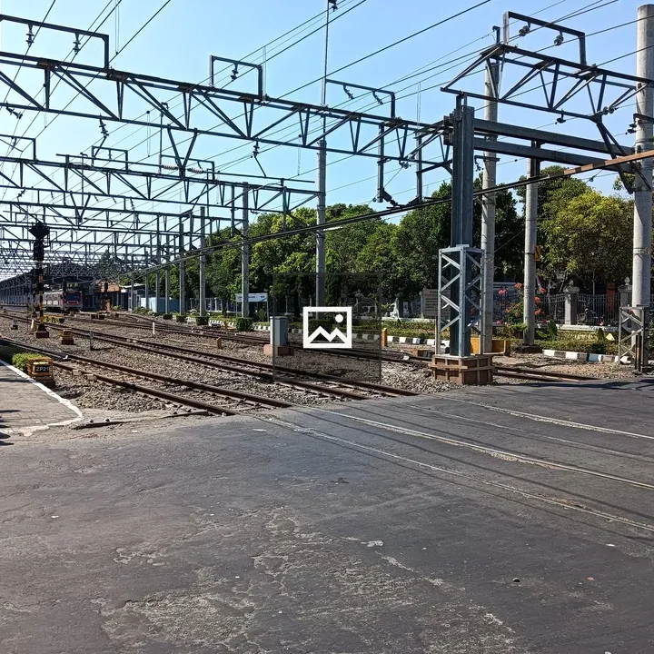 Level railroad crossing with tracks and lines