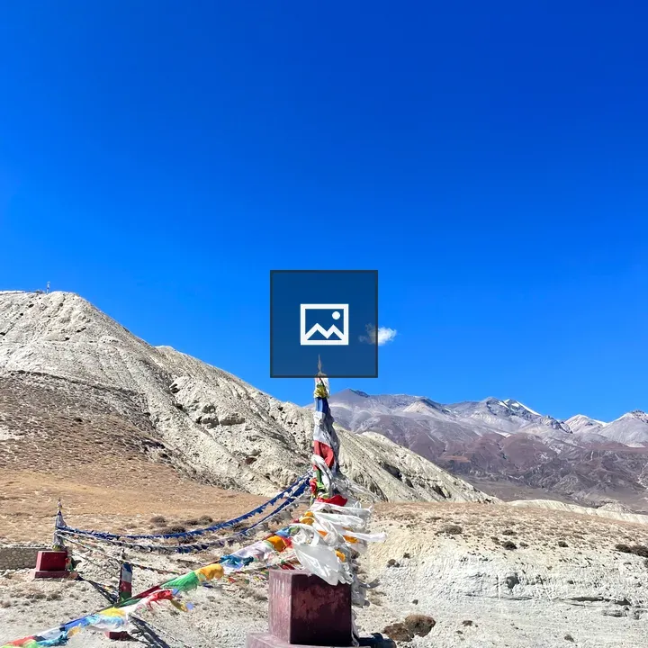Red stupa with prayer flags