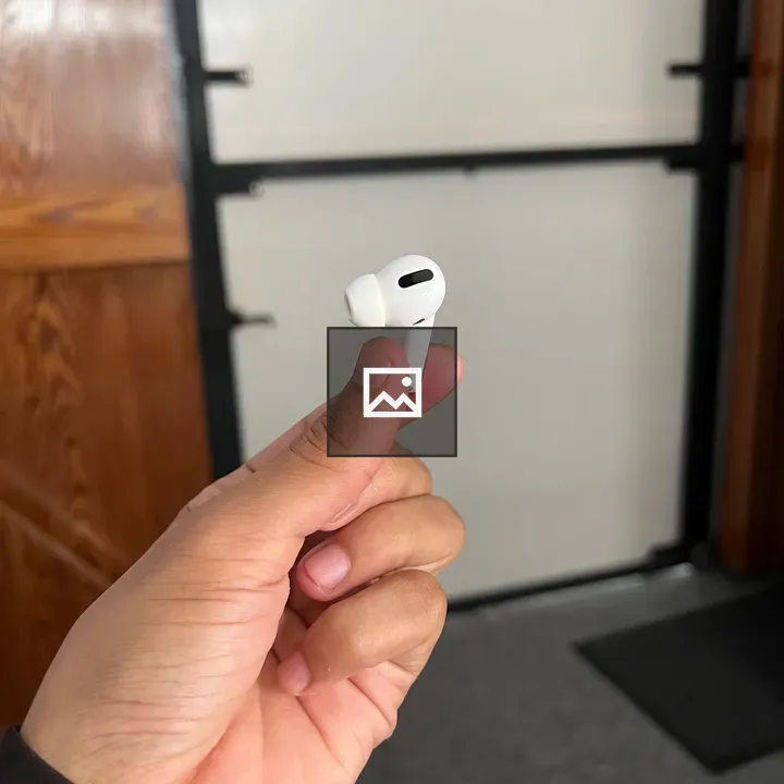 Grasping the earpod with fingers