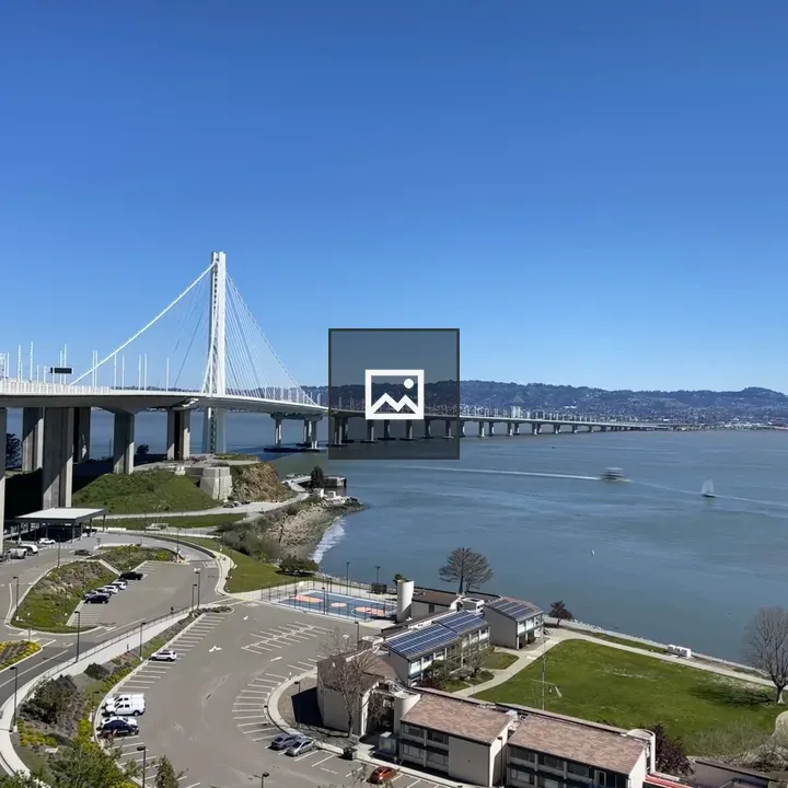 Bridge over water with hills