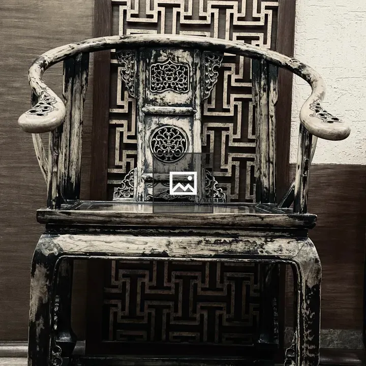 Vintage wooden chair with carvings