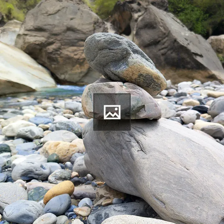 Cairn Stones by Riverbank