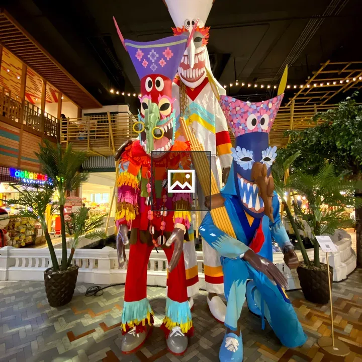 Colorful wooden figures on display