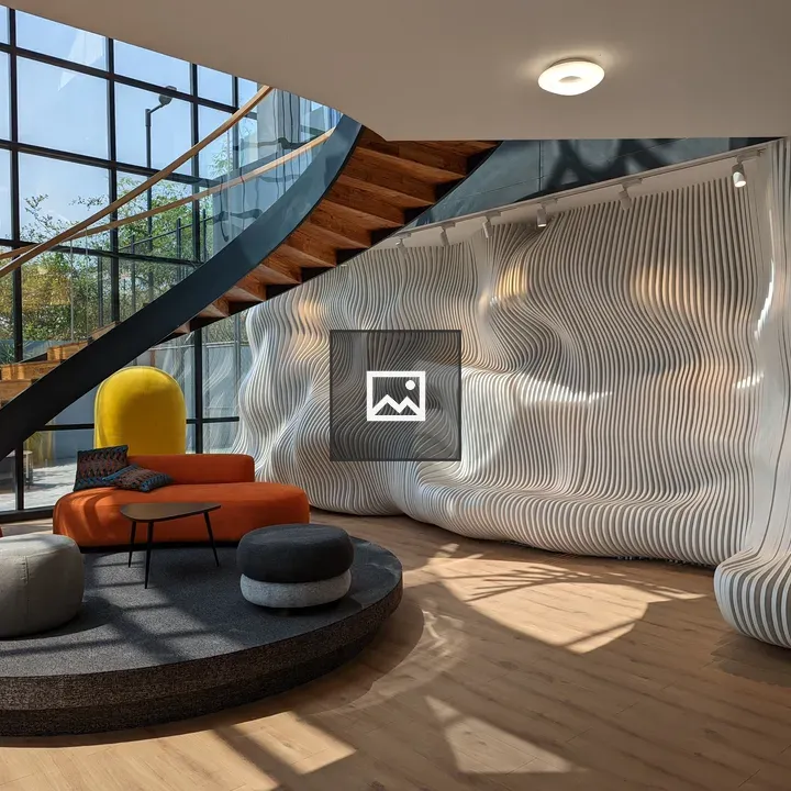 Modern lounge with curved staircase