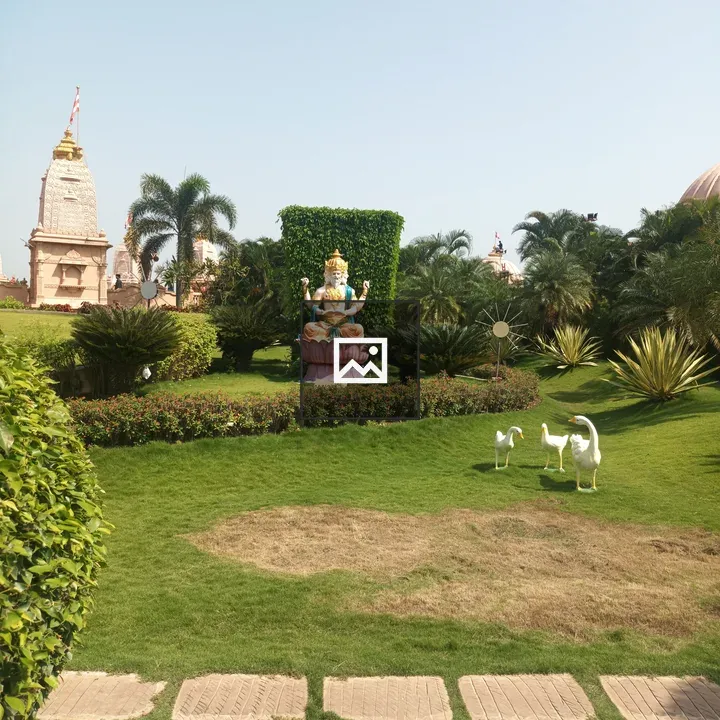 Garden scene with statue and ducks