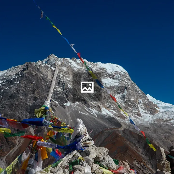 Prayer Flags Over Mountain Ridge