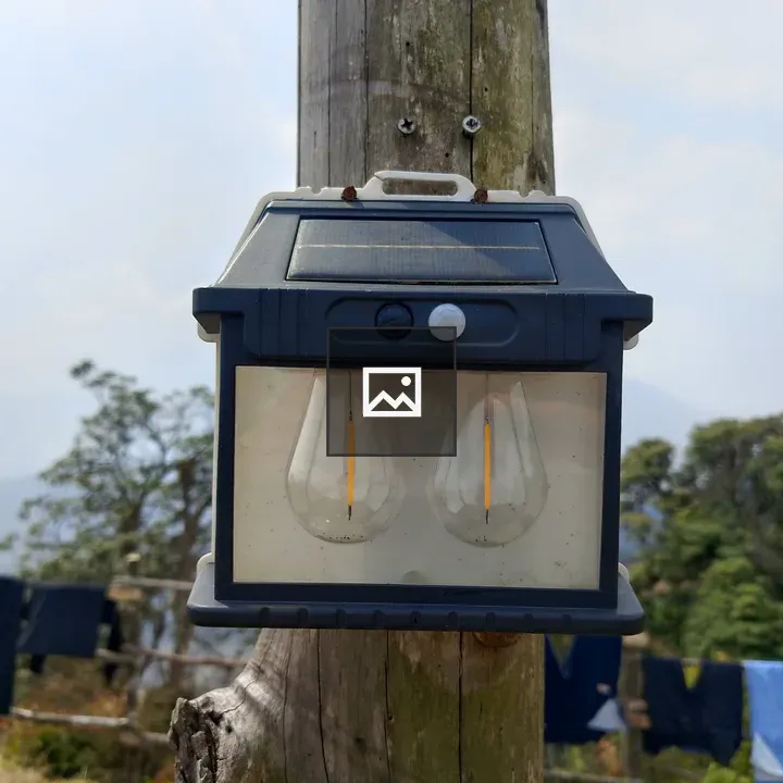 Solar-powered outdoor wall lamp on wooden pole
