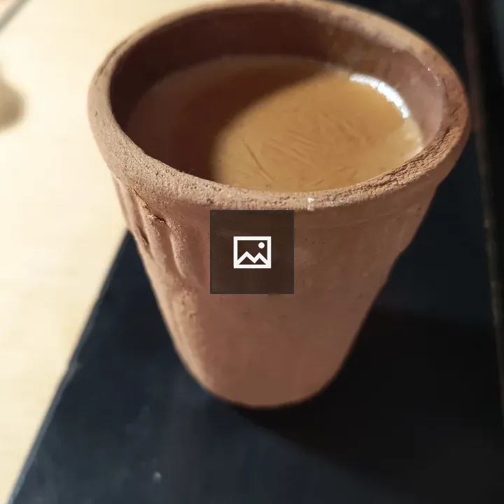Kulhad tea on a carrom board