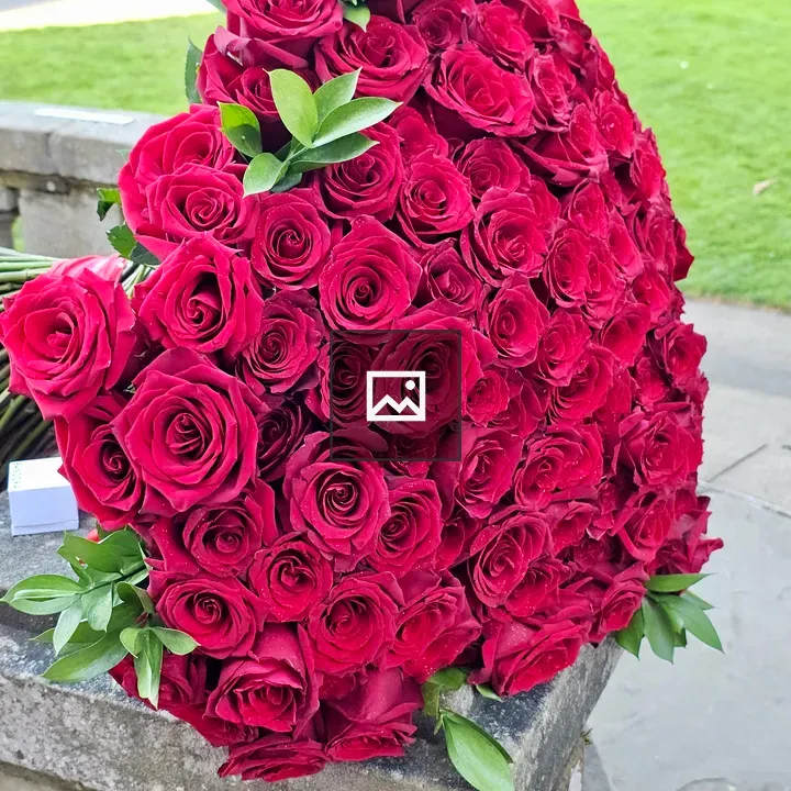 Heart-shaped bouquet of red roses