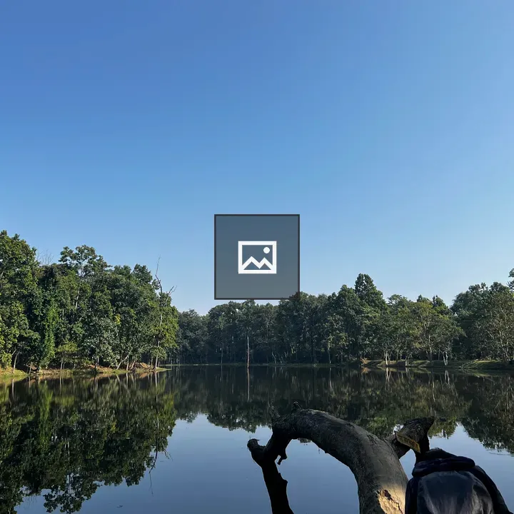 Calm lake with reflected trees