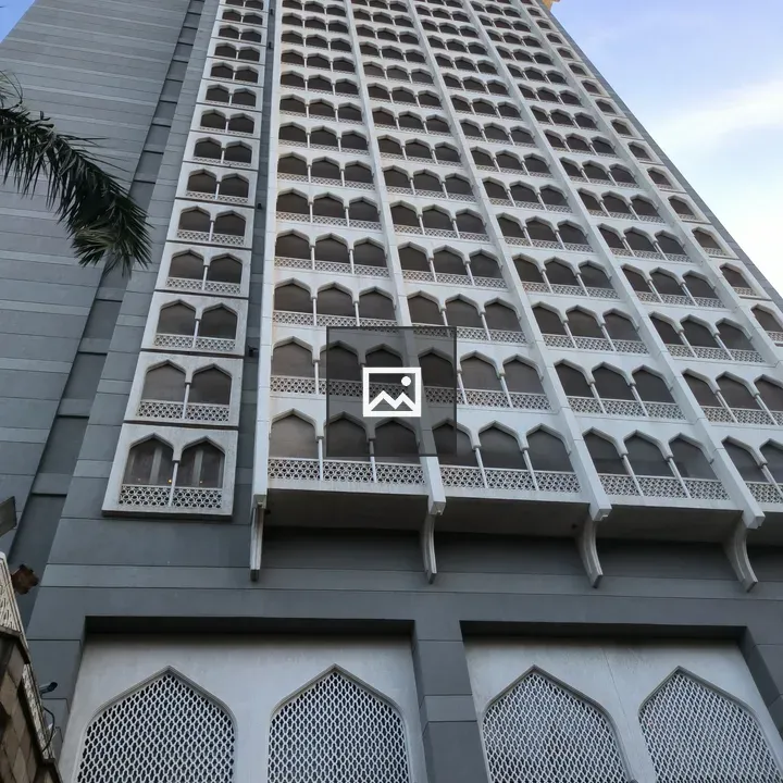 Tall modern building with arched windows