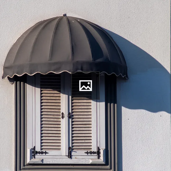 Closed wooden window with awning