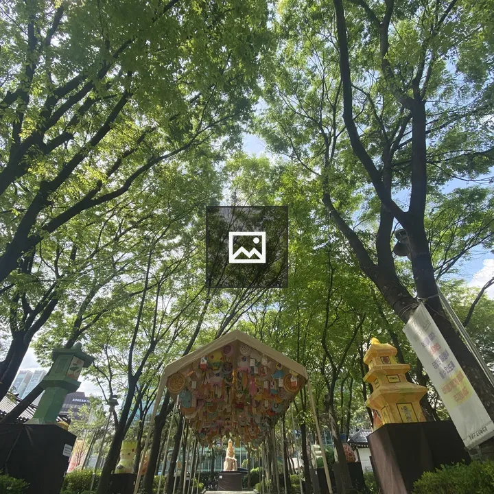 Pathway to colorful tent-like structure