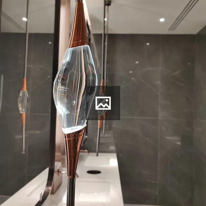 Elongated glass light fixture