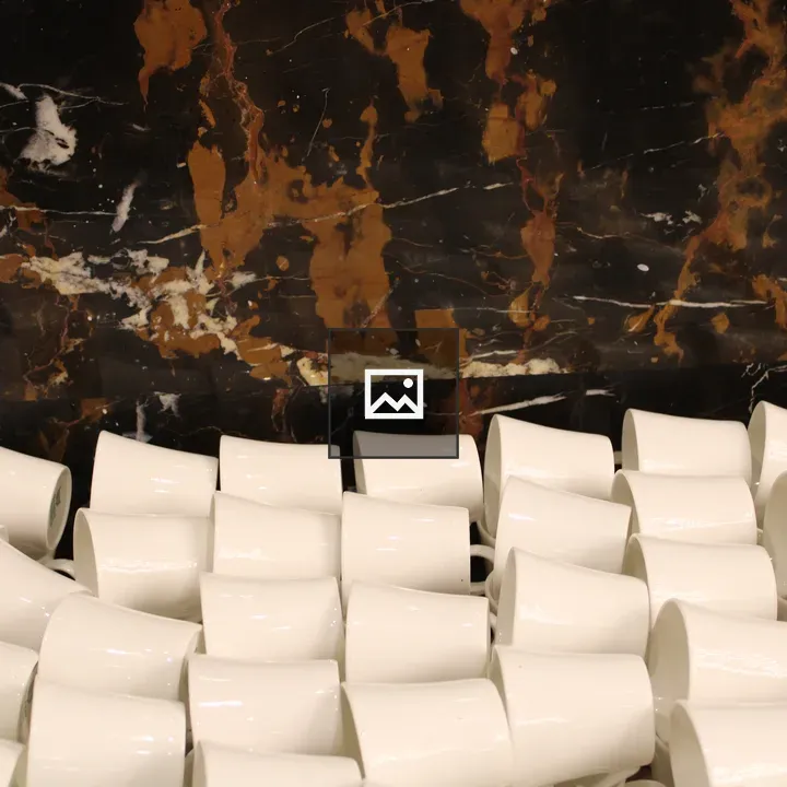 Wall with white tea cups