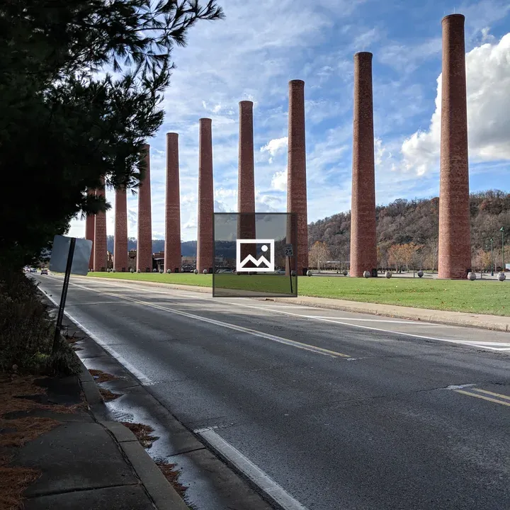 Old smoke stacks by the road