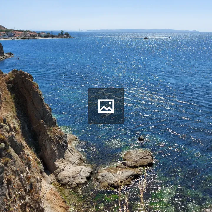 Coastal Cliffs and Calm Ocean