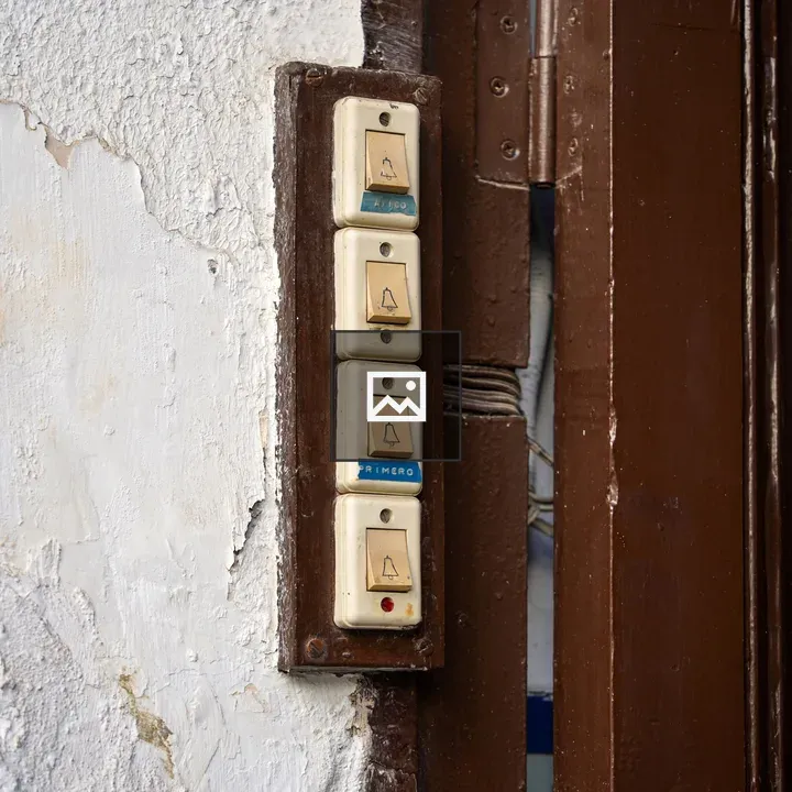 Vintage doorbells on wall