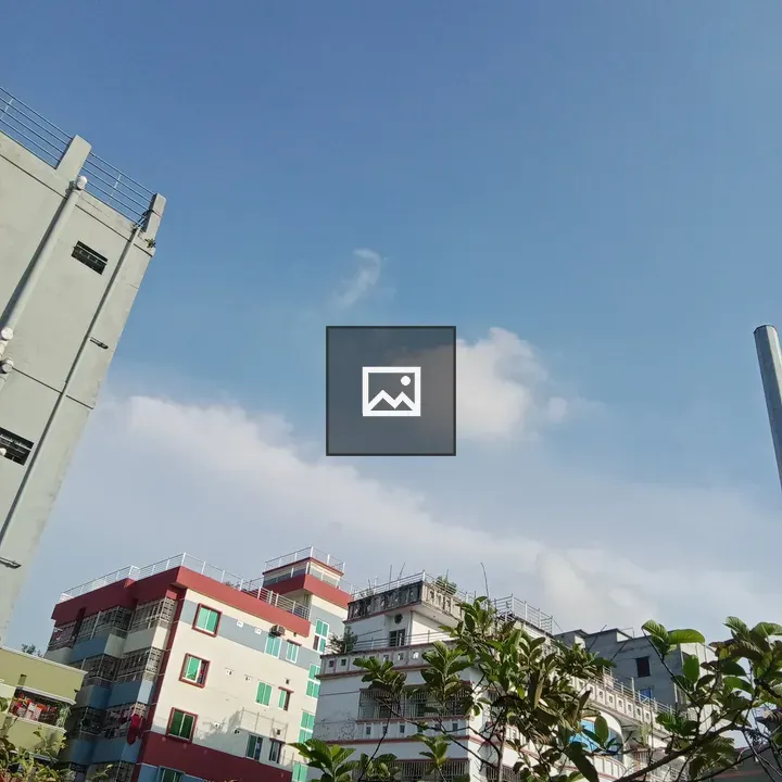 Man with blue sky and buildings