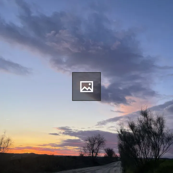 Dirt road at sunset