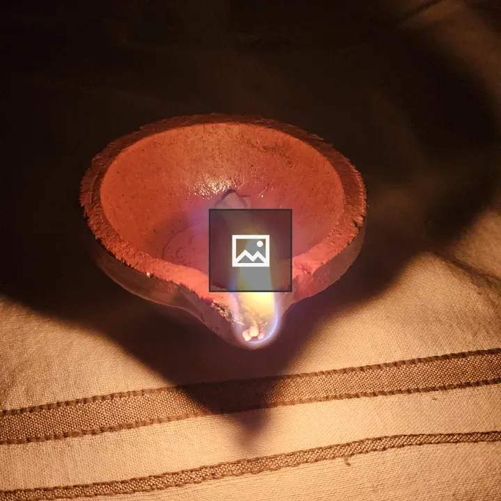 Clay lamp diya at festival night