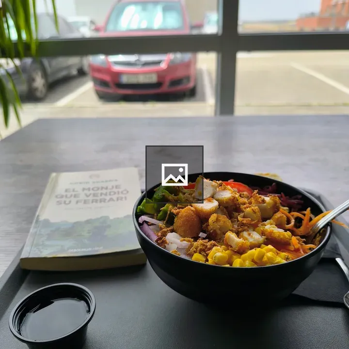 Poke bowl on black tray