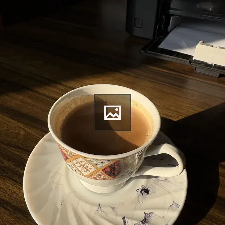 Teacup and saucer on desk