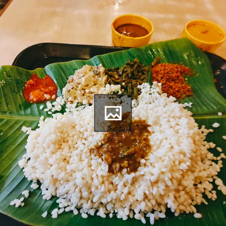 Banana leaf meal with rice and sides
